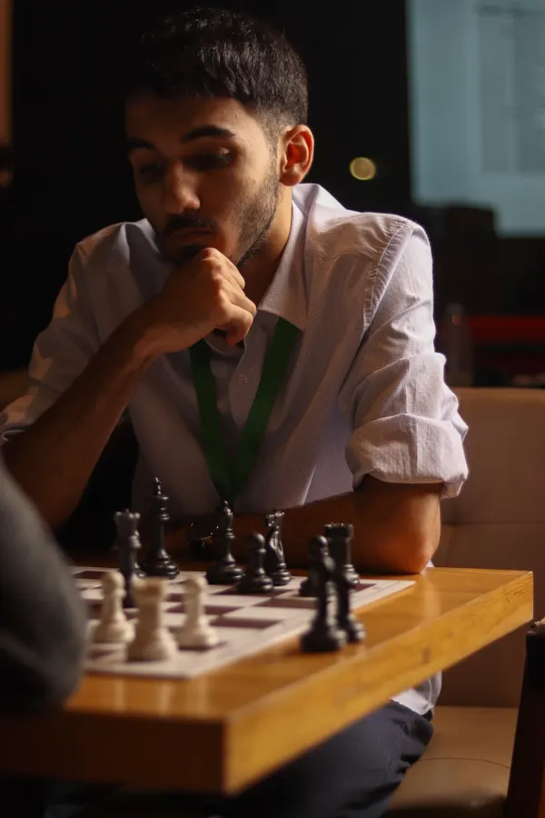 Chess player thinking
