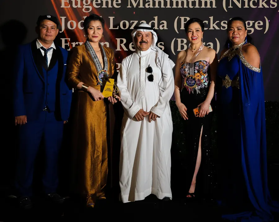 Guests and performers on stage