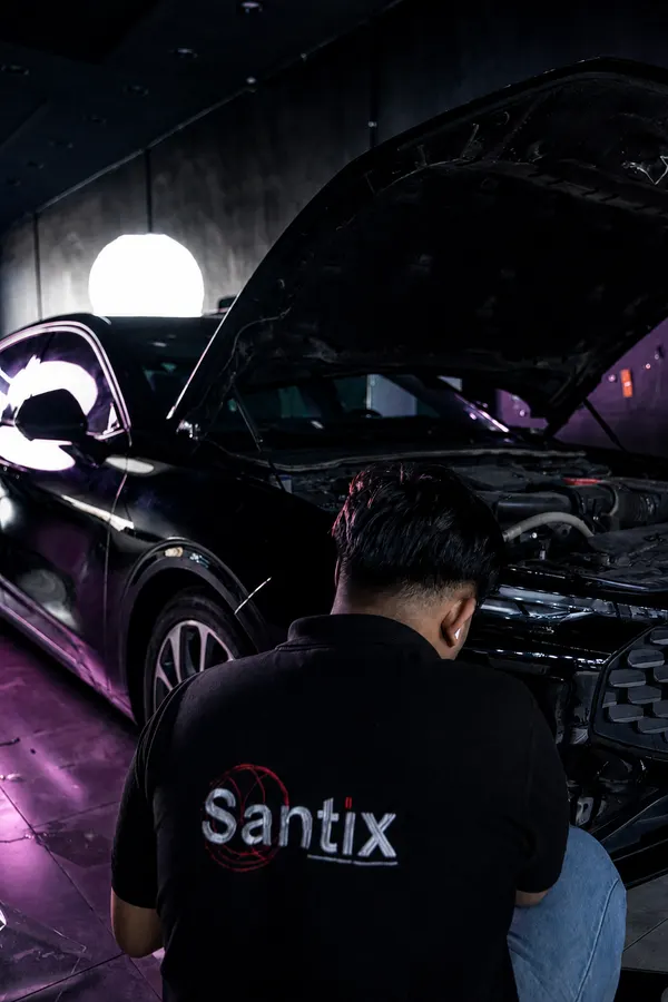 Technician under the bonnet